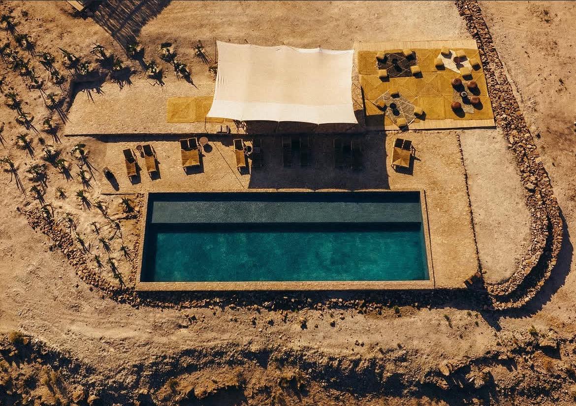 Relaxing by the Infinity Pool at Agafay Silent